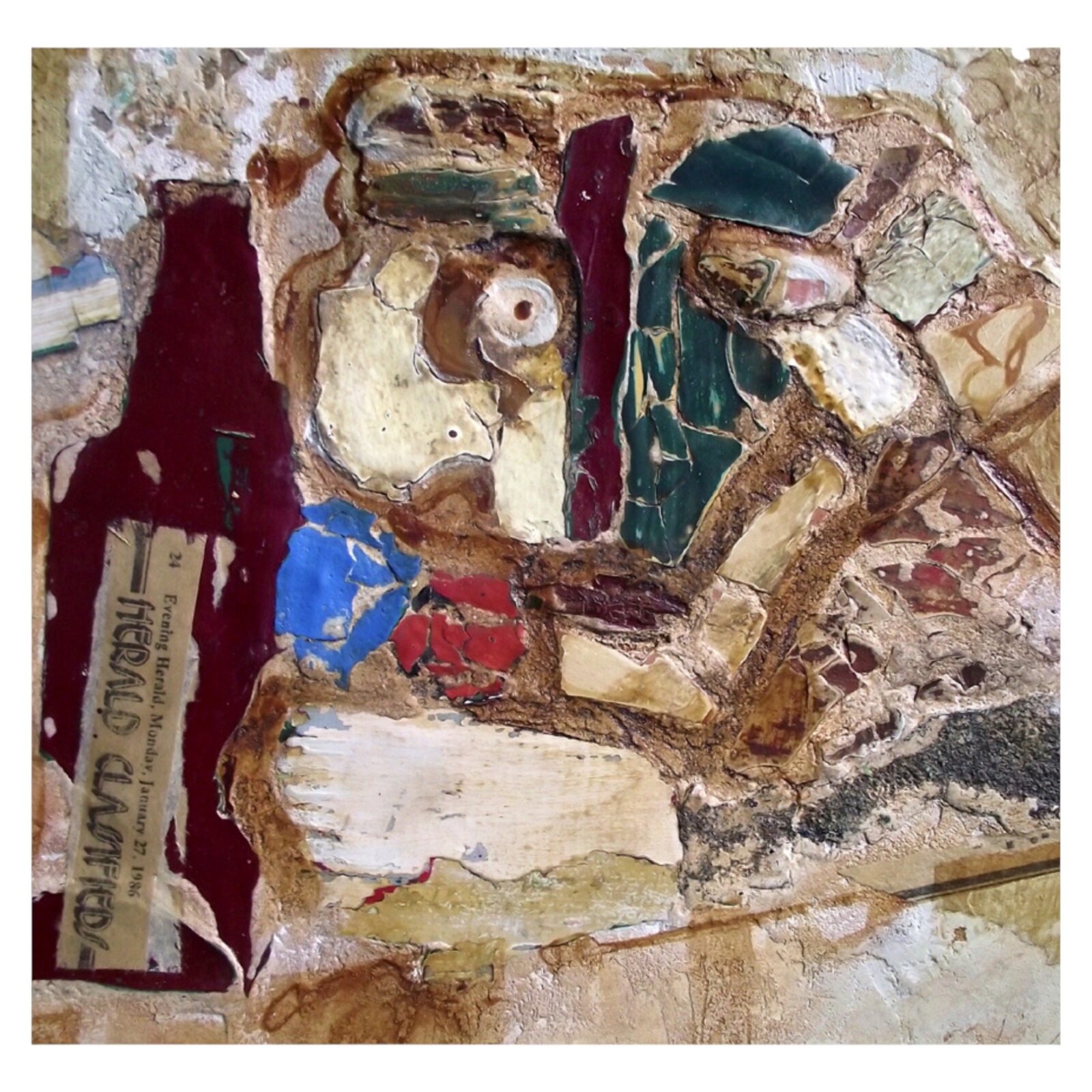 Mixed media artwork combining aged paint and plaster fragments embedded in mortar.